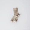 Beige knitted socks and other basic styles for both men and women details Picture